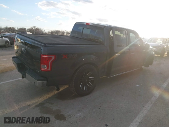 2015 Ford F-150 XLT with VIN 1FTEW1EFXFFA07342, listed as a IAAI auction lot 41748383 with 162,218 mi miles. Bid and sale history available at carsss.com. Image 4.