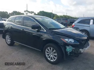 2010 Mazda CX-7 Sport with VIN JM3ER2W51A0310645, listed as a IAAI auction lot 41948890 with 139,777 mi miles. Bid and sale history available at carsss.com. Image 1.