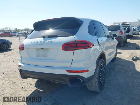 2016 Porsche Cayenne with VIN WP1AA2A29GLA04374, listed as a IAAI auction lot 41988374 with 144,716 mi miles. Bid and sale history available at carsss.com. Image 4.