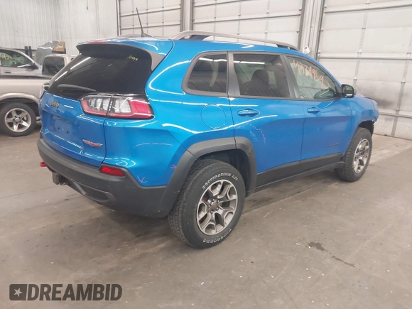 2020 Jeep Cherokee Trailhawk with VIN 1C4PJMBX6LD656570, listed as a IAAI auction lot 42399597 with 88,348 mi miles and . Bid and sale history available at DreamBid. Image 4.