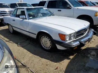 1989 Mercedes-Benz 560 with VIN WDBBA48D0KA098625, listed as a Copart auction lot 73863784 with 30,648 mi miles and Salvage Title. Bid and sale history available at carsss.com. Image 4.