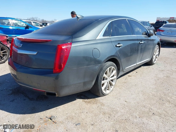 2017 Cadillac XTS Luxury with VIN 2G61M5S32H9159250, listed as a IAAI auction lot 41851329 with 129,944 mi miles. Bid and sale history available at carsss.com. Image 4.