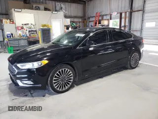2018 Ford Fusion Titanium с VIN 3FA6P0D9XJR241506, выставлен на аукционе Copart как лот 60736525 с пробегом 109 548 миль миль и Списание • Salvage title. История ставок и продаж доступна на DreamBid. Изображение 1.