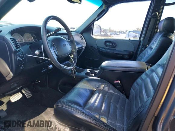 2002 Ford F-150 Harley Davidson with VIN 1FTRW07362KC77880, listed as a Copart auction lot 75259594 with 103,591 mi miles and Salvage Title. Bid and sale history available at carsss.com. Image 7.