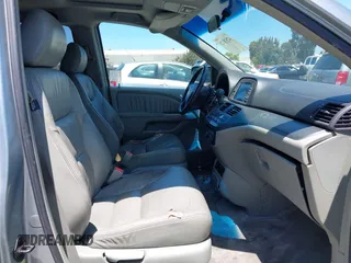2006 Honda Odyssey EX-L z VIN 5FNRL38716B051664, wystawiony jako IAAI lot #42520320 z przebiegiem 304 835 mil mil oraz . Historia ofert i sprzedaży dostępna na DreamBid. Obrazek 5.