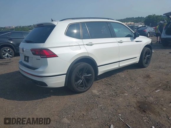 2023 Volkswagen Tiguan SE R-Line Black z VIN 3VV8B7AX9PM055640, wystawiony jako IAAI lot #42411380 z przebiegiem 68 922 mil mil oraz . Historia ofert i sprzedaży dostępna na DreamBid. Obrazek 4.