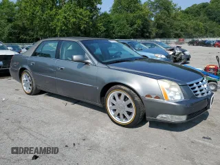 2007 Cadillac DTS V8 z VIN 1G6KD57Y67U136984, wystawiony jako Copart lot #65570084 z przebiegiem 114 814 mil mil oraz Szkoda całkowita • Salvage title. Historia ofert i sprzedaży dostępna na DreamBid. Obrazek 4.