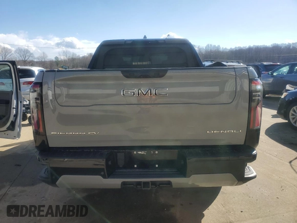 2024 GMC Sierra 1500 with VIN 1GT401EL5RU401222, listed as a Copart auction lot 43251615 with 8,806 mi miles and Salvage Title. Bid and sale history available at DreamBid. Image 6.