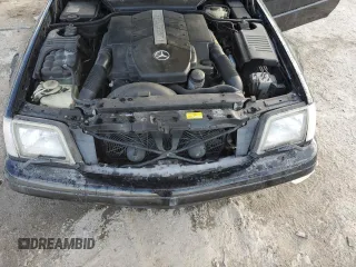 1999 Mercedes-Benz SL-Class with VIN WDBFA68F0XF186163, listed as a Copart auction lot 82669544 with 184,054 mi miles and Salvage Title. Bid and sale history available at carsss.com. Image 11.