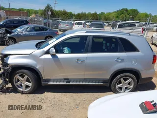 2015 Kia Sorento LX with VIN 5XYKTCA68FG641582, listed as a IAAI auction lot 42063254 with 159,125 mi miles and . Bid and sale history available at DreamBid. Image 14.