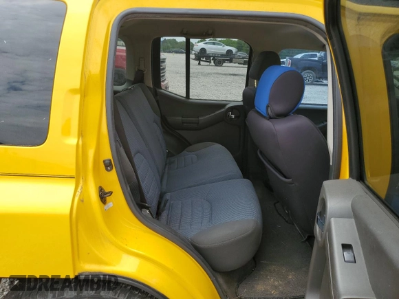 2005 Nissan Xterra SE z VIN 5N1AN08WX5C620712, wystawiony jako Copart lot #57815735 z przebiegiem 203 340 mil mil oraz Szkoda całkowita • Salvage title. Historia ofert i sprzedaży dostępna na DreamBid. Obrazek 11.