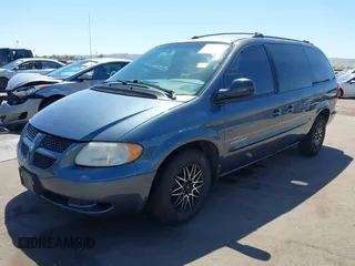 2001 Dodge Caravan Sport with VIN 2B4GP44351R298698, listed as a IAAI auction lot 42035781 with 203,496 mi miles and . Bid and sale history available at DreamBid. Image 2.