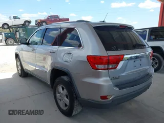 2011 Jeep Grand Cherokee Laredo with VIN 1J4RR4GG3BC540655, listed as a IAAI auction lot 42158522 with 214,341 mi miles and . Bid and sale history available at DreamBid. Image 3.