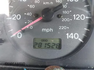 1999 Mazda Protege DX z VIN JM1BJ2229X0189290, wystawiony jako IAAI lot #41796448 z przebiegiem 281 528 mil mil oraz . Historia ofert i sprzedaży dostępna na DreamBid. Obrazek 16.