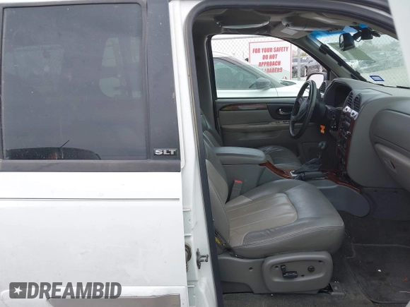 2003 GMC Envoy SLE with VIN 1GKDS13S532253648, listed as a IAAI auction lot 41850094 with 147,254 mi miles. Bid and sale history available at carsss.com. Image 5.