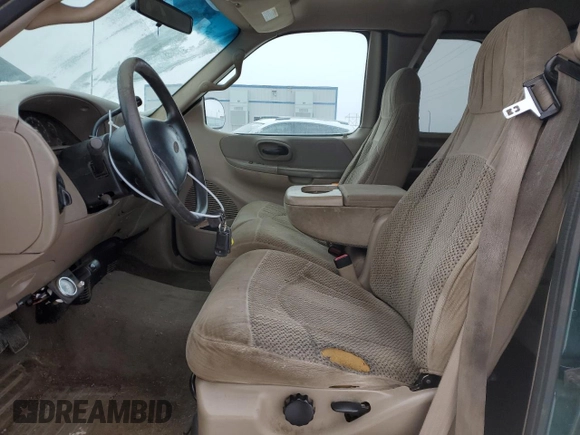 2000 Ford F-150 XL with VIN 2FTRX18L5YCB19092, listed as a Copart auction lot 43812505 with 139,503 mi miles and Salvage Title. Bid and sale history available at carsss.com. Image 7.
