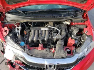 2020 Honda Fit LX z VIN 3HGGK5H43LM703981, wystawiony jako Copart lot #51295285 z przebiegiem 73 328 mil mil oraz Szkoda całkowita • Salvage title. Historia ofert i sprzedaży dostępna na DreamBid. Obrazek 11.