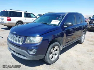 2014 Jeep Compass Sport with VIN 1C4NJCBB2ED737297, listed as a IAAI auction lot 42056598 with 185,155 mi miles. Bid and sale history available at carsss.com. Image 2.
