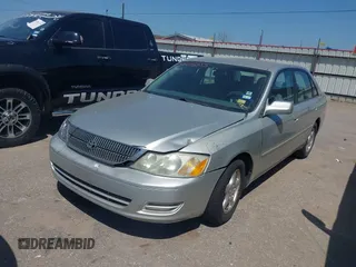 2000 Toyota Avalon XL with VIN 4T1BF28B5YU027140, listed as a IAAI auction lot 42005055 with 138,364 mi miles and . Bid and sale history available at DreamBid. Image 2.
