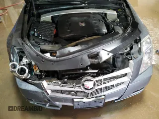 2010 Cadillac CTS Luxury with VIN 1G6DE5EG6A0136384, listed as a Copart auction lot 51216855 with 56,059 mi miles and Salvage Title. Bid and sale history available at carsss.com. Image 11.