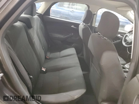 2016 Ford Focus SE z VIN 1FADP3F20GL305441, wystawiony jako Copart lot #55445105 z przebiegiem 117 033 mil mil oraz Szkoda całkowita • Salvage title. Historia ofert i sprzedaży dostępna na DreamBid. Obrazek 10.