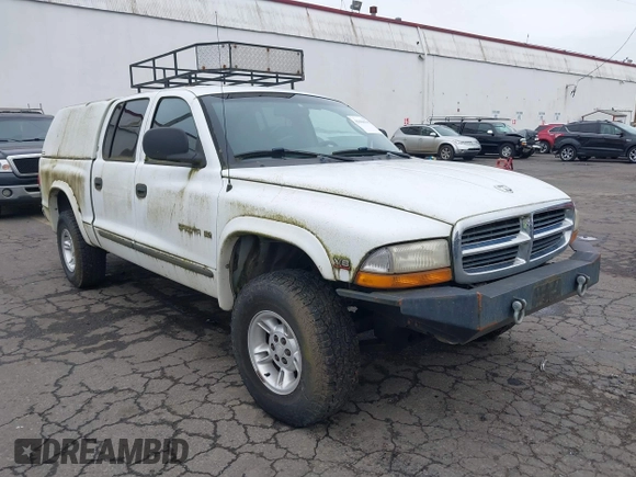 2000 Dodge Dakota Sport with VIN 1B7GG2AN2YS760690, listed as a IAAI auction lot 41616767 with 225,478 mi miles and . Bid and sale history available at carsss.com. Image 1.