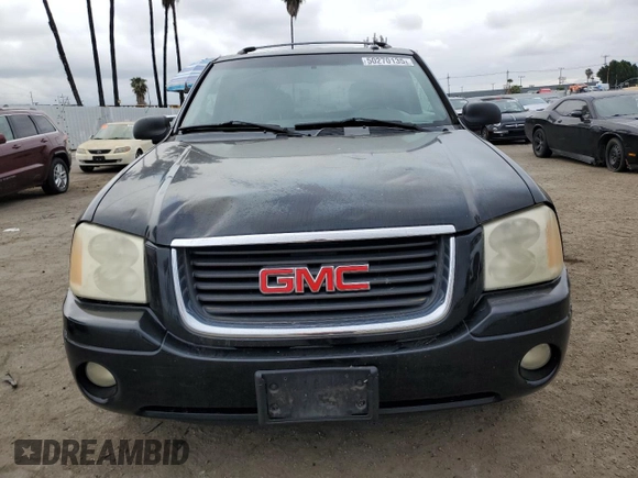 2004 GMC Envoy SLE with VIN 1GKDT13S442155788, listed as a Copart auction lot 50270135 with 164,271 mi miles and Salvage Title. Bid and sale history available at carsss.com. Image 5.