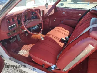 1974 Chevrolet Monte Carlo z VIN 1H57H4R75663, wystawiony jako Copart lot #81492924 z przebiegiem 90 431 mil mil oraz Tytuł czysty. Historia ofert i sprzedaży dostępna na DreamBid. Obrazek 9.