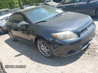 2005 Scion tC with VIN JTKDE177750026736, listed as a IAAI auction lot 42075370 with 246,192 mi miles. Bid and sale history available at carsss.com. Image 1.