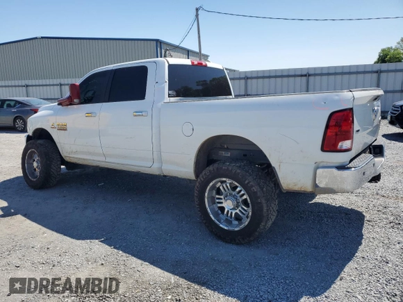 2017 Ram 2500 Big Horn with VIN 3C6UR5DLXHG725449, listed as a Copart auction lot 51876565 with 198,422 mi miles and Salvage title. Bid and sale history available at DreamBid. Image 2.