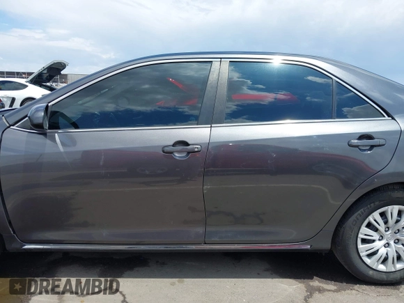 2014 Toyota Camry L with VIN 4T1BF1FK0EU853905, listed as a IAAI auction lot 42217834 with 108,612 mi miles and . Bid and sale history available at DreamBid. Image 14.