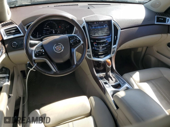 2015 Cadillac SRX Luxury Collection with VIN 3GYFNBE34FS555989, listed as a Copart auction lot 52765485 with 93,988 mi miles and Salvage Title. Bid and sale history available at DreamBid. Image 8.
