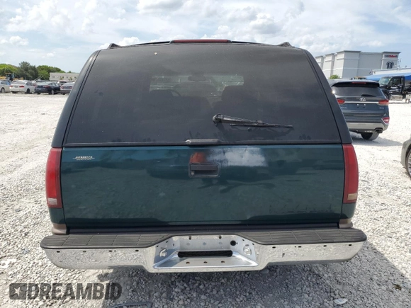 1995 Chevrolet Tahoe z VIN 1GNEC13K1SJ439759, wystawiony jako Copart lot #57784845 z przebiegiem 190 566 mil mil oraz Czysty tytuł • Clean title. Historia ofert i sprzedaży dostępna na DreamBid. Obrazek 6.