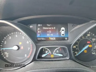 2016 Ford Focus SE with VIN 1FADP3FE8GL381855, listed as a Copart auction lot 57366645 with 104,709 mi miles and Salvage title. Bid and sale history available at DreamBid. Image 9.