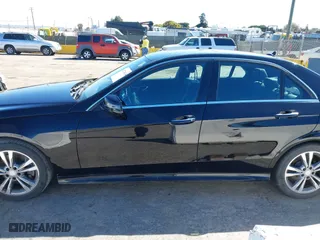 2016 Mercedes-Benz E-Class E 250 BlueTEC Luxury with VIN WDDHF0EB9GB274152, listed as a IAAI auction lot 41714634 with 77,661 mi miles. Bid and sale history available at carsss.com. Image 14.