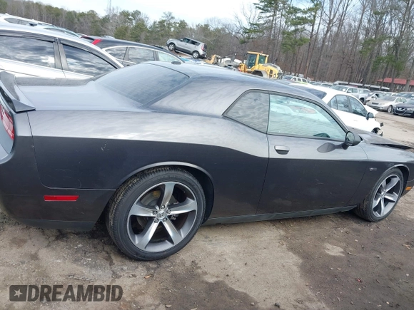 2014 Dodge Challenger R/T z VIN 2C3CDYBT7EH293104, wystawiony jako IAAI lot #41452435 z przebiegiem 49 728 mil mil oraz . Historia ofert i sprzedaży dostępna na DreamBid. Obrazek 13.