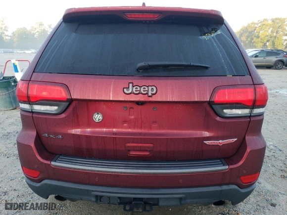 2019 Jeep Grand Cherokee Trailhawk with VIN 1C4RJFLTXKC718606, listed as a Copart auction lot 72661234 with 70,169 mi miles and Salvage Title. Bid and sale history available at carsss.com. Image 6.
