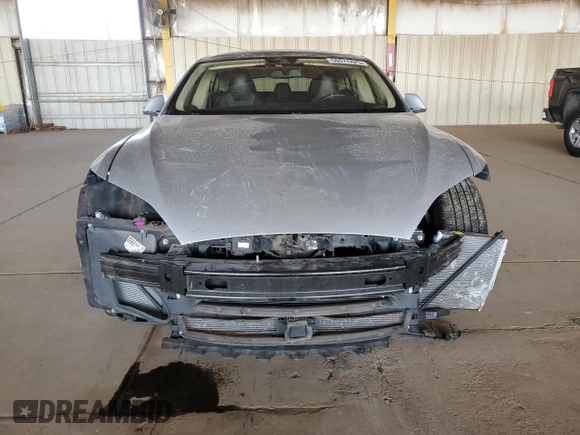 2016 Tesla Model S 90D with VIN 5YJSA1E29GF120543, listed as a Copart auction lot 56574425 with 56,412 mi miles and Salvage title. Bid and sale history available at DreamBid. Image 5.