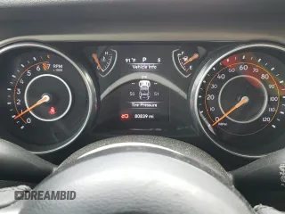 2018 Jeep Wrangler Unlimited Sport z VIN 1C4HJXDG1JW225039, wystawiony jako Copart lot #58772725 z przebiegiem 80 839 mil mil oraz Szkoda całkowita • Salvage title. Historia ofert i sprzedaży dostępna na DreamBid. Obrazek 9.