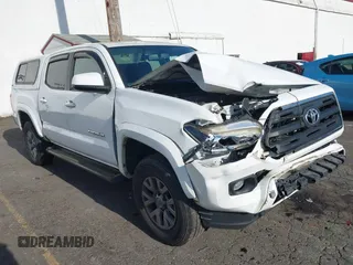 2017 Toyota Tacoma SR5 with VIN 3TMAZ5CN3HM045330, listed as a IAAI auction lot 41371012 with 20,170 mi miles and . Bid and sale history available at DreamBid. Image 1.