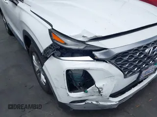 2020 Hyundai Santa Fe SE with VIN 5NMS23AD8LH285363, listed as a IAAI auction lot 42408647 with 60,058 mi miles and . Bid and sale history available at DreamBid. Image 6.