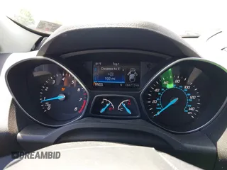 2016 Ford Escape SE z VIN 1FMCU9GX1GUC04815, wystawiony jako IAAI lot #42235499 z przebiegiem 84 713 mil mil oraz . Historia ofert i sprzedaży dostępna na DreamBid. Obrazek 7.