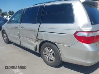 2006 Honda Odyssey EX-L with VIN 5FNRL38766B038599, listed as a IAAI auction lot 41989217 with 164,118 mi miles. Bid and sale history available at carsss.com. Image 6.