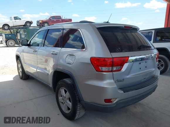 2011 Jeep Grand Cherokee Laredo with VIN 1J4RR4GG3BC540655, listed as a IAAI auction lot 42158522 with 214,341 mi miles and . Bid and sale history available at DreamBid. Image 3.