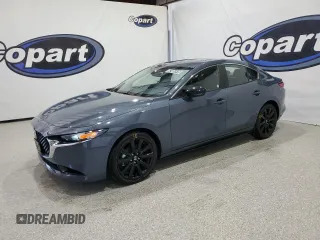 2025 Mazda 3 S Carbon Edition with VIN 3MZBPBCM7SM457187, listed as a Copart auction lot 62405515 with 1,309 mi miles and Salvage title. Bid and sale history available at DreamBid. Image 1.