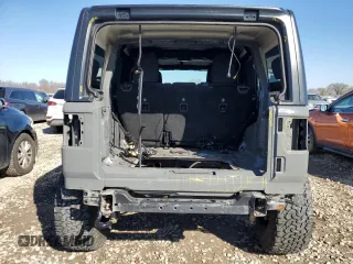 2018 Jeep Wrangler Unlimited Sport S with VIN 1C4HJXDG7JW298738, listed as a Copart auction lot 49312355 with 69,983 mi miles and Salvage title. Bid and sale history available at DreamBid. Image 6.