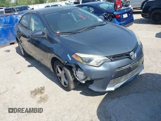 2015 Toyota Corolla L z VIN 5YFBURHE6FP328815, wystawiony jako IAAI lot #42373855 z przebiegiem 139 561 mil mil oraz . Historia ofert i sprzedaży dostępna na DreamBid. Obrazek 1.