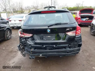 2014 BMW X1 xDrive28i with VIN WBAVL1C5XEVY16666, listed as a IAAI auction lot 41924589 with 98,731 mi miles. Bid and sale history available at carsss.com. Image 17.