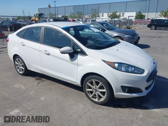 2019 Ford Fiesta SE z VIN 3FADP4BJ6KM143891, wystawiony jako IAAI lot #42244796 z przebiegiem 62 143 mil mil oraz . Historia ofert i sprzedaży dostępna na DreamBid. Obrazek 1.