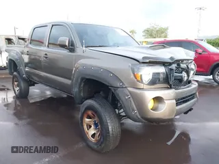 2011 Toyota Tacoma PreRunner z VIN 3TMJU4GN8BM110084, wystawiony jako IAAI lot #41667559 z przebiegiem 128 340 mil mil oraz . Historia ofert i sprzedaży dostępna na DreamBid. Obrazek 1.